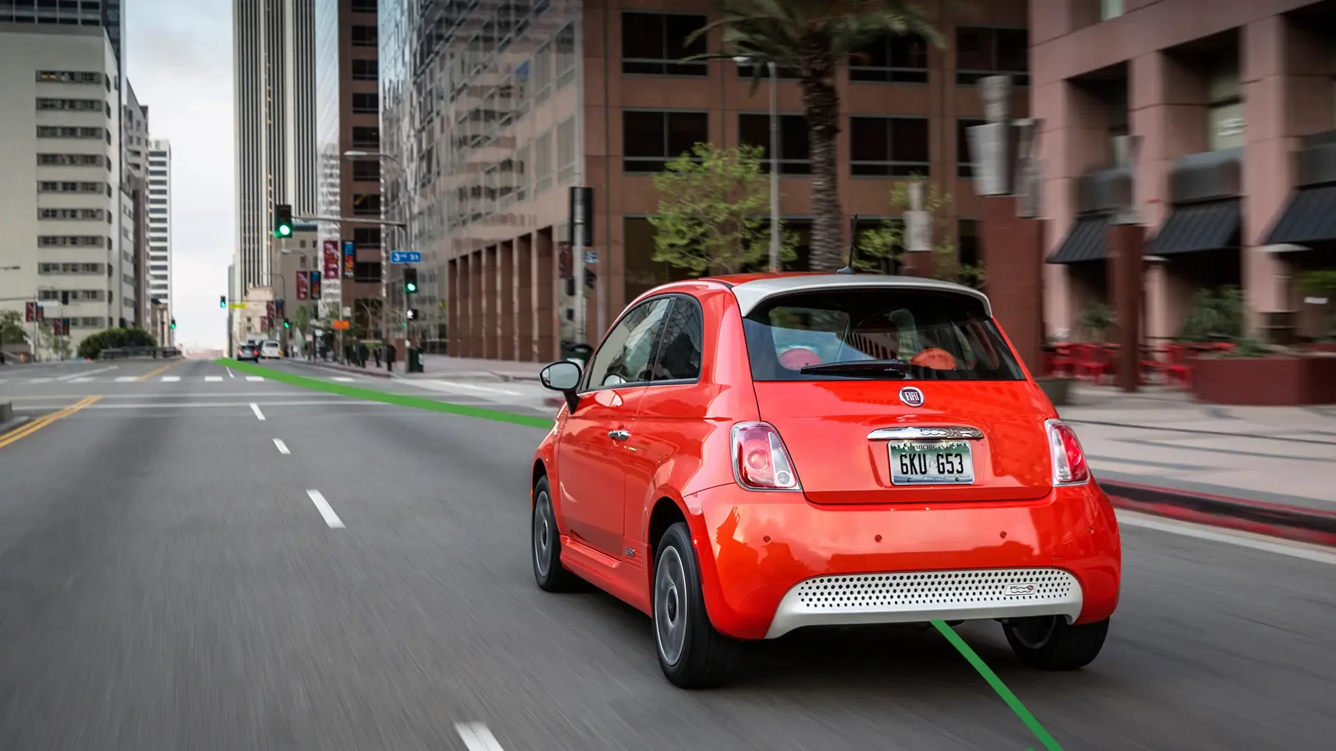 Fiat Driving away in the city