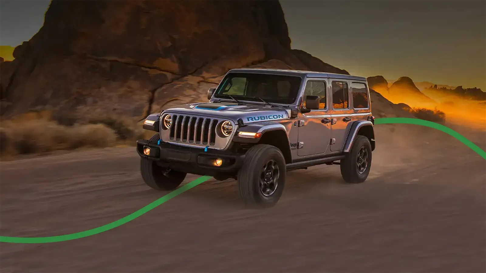 wrangler unlimited 4xe driving on dusty road