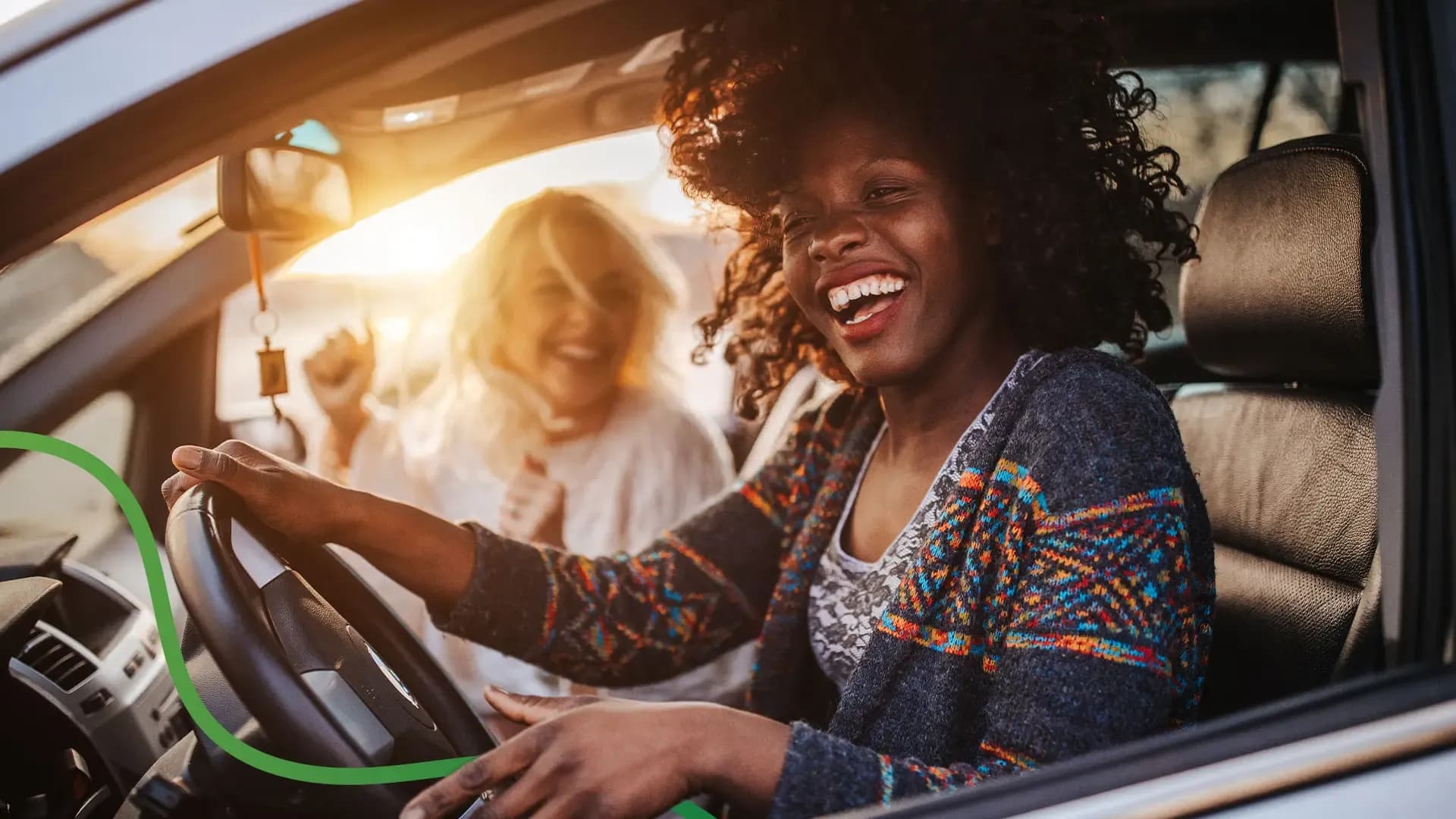 Women driving and listening to music