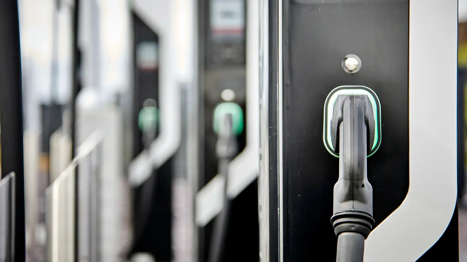 Electric charging station pumps in a line
