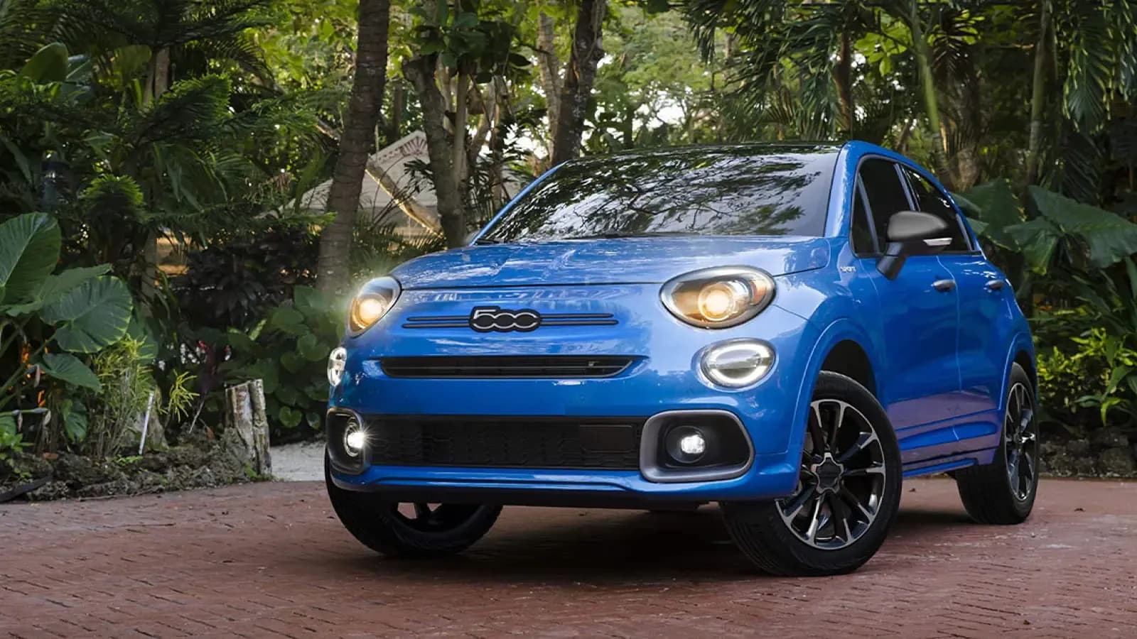 FIAT 500 with Lights on in the tropics