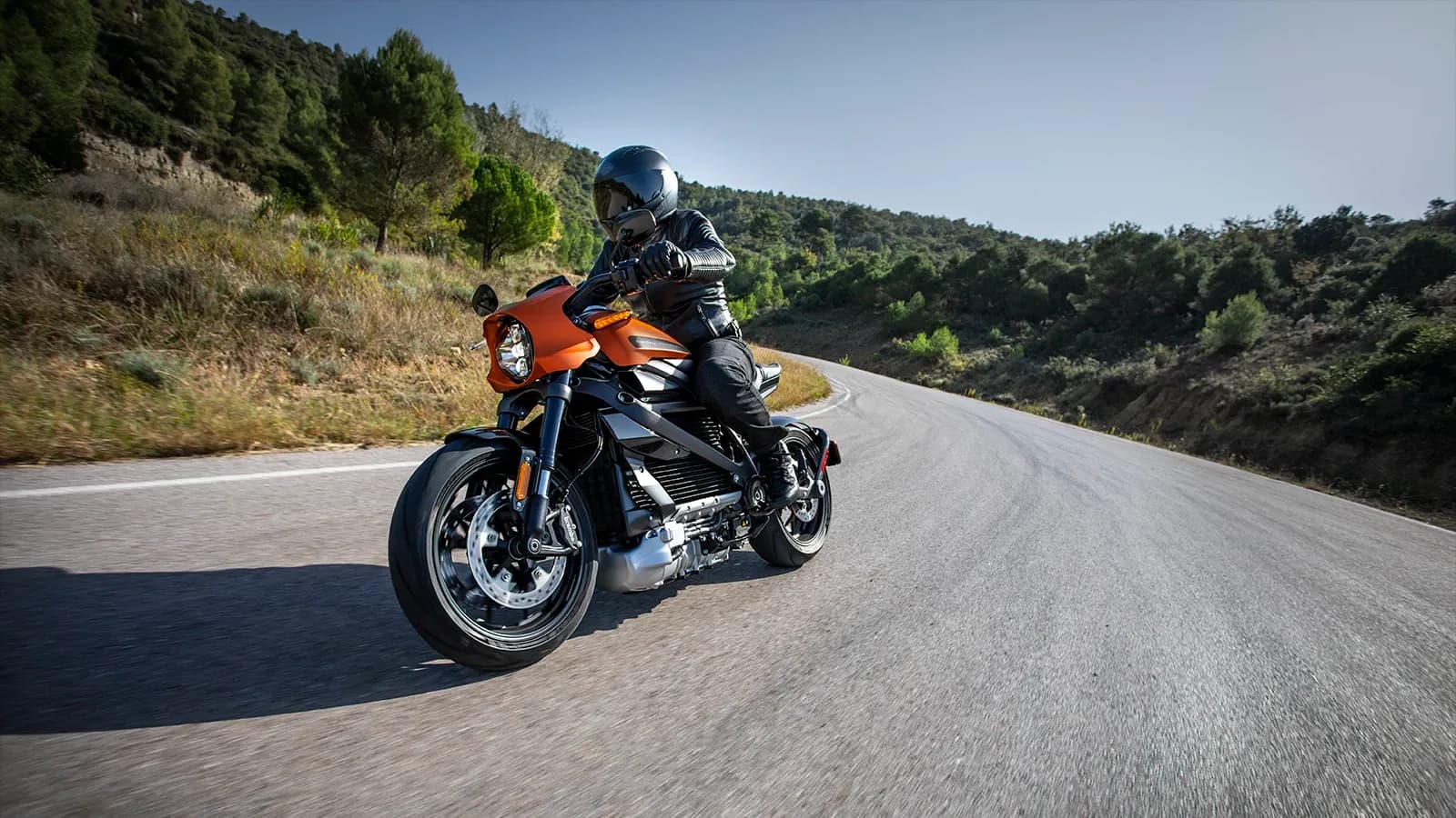Man Riding a Fast Motorcycle