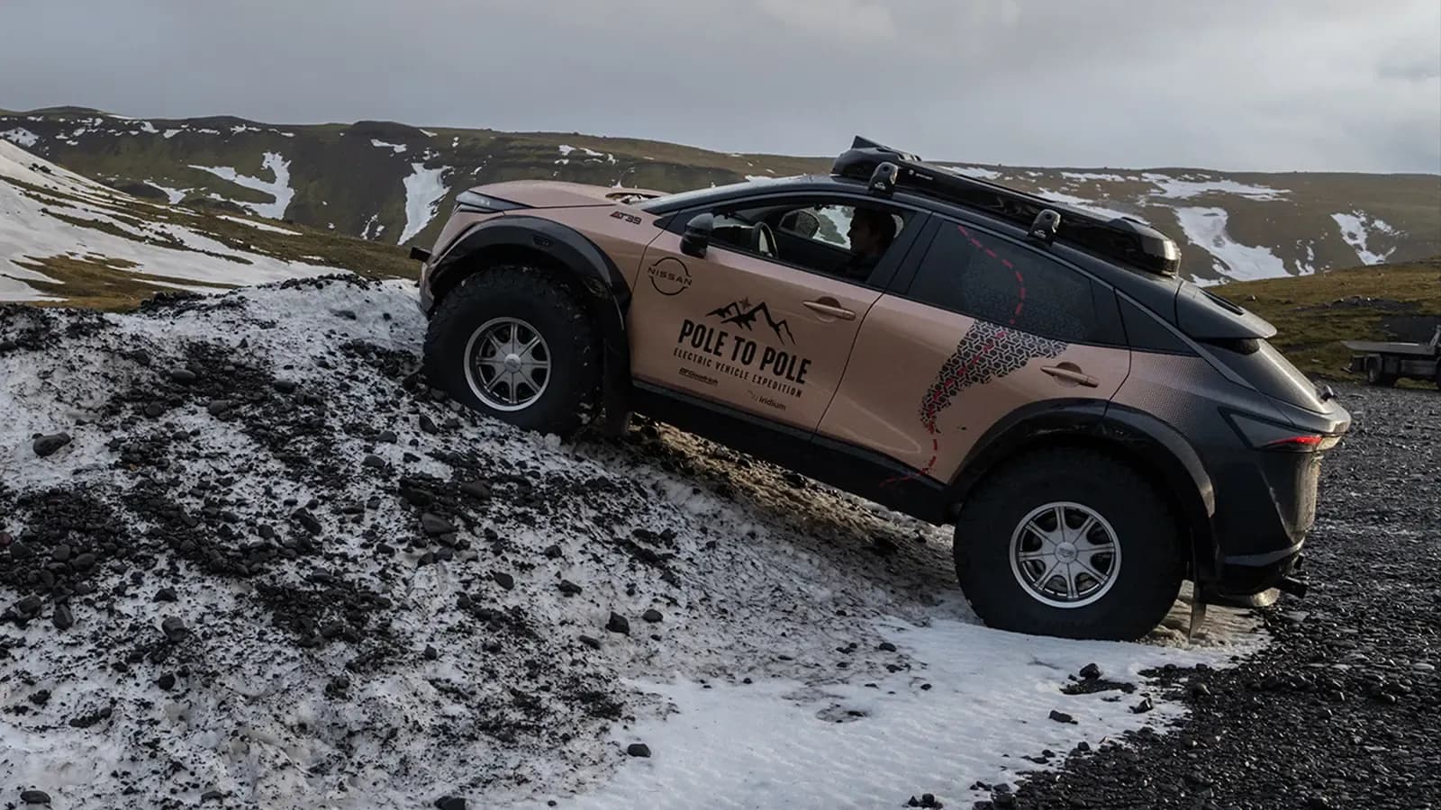 Nissan Ariya e-4orce in rocky and snowy environment. 
