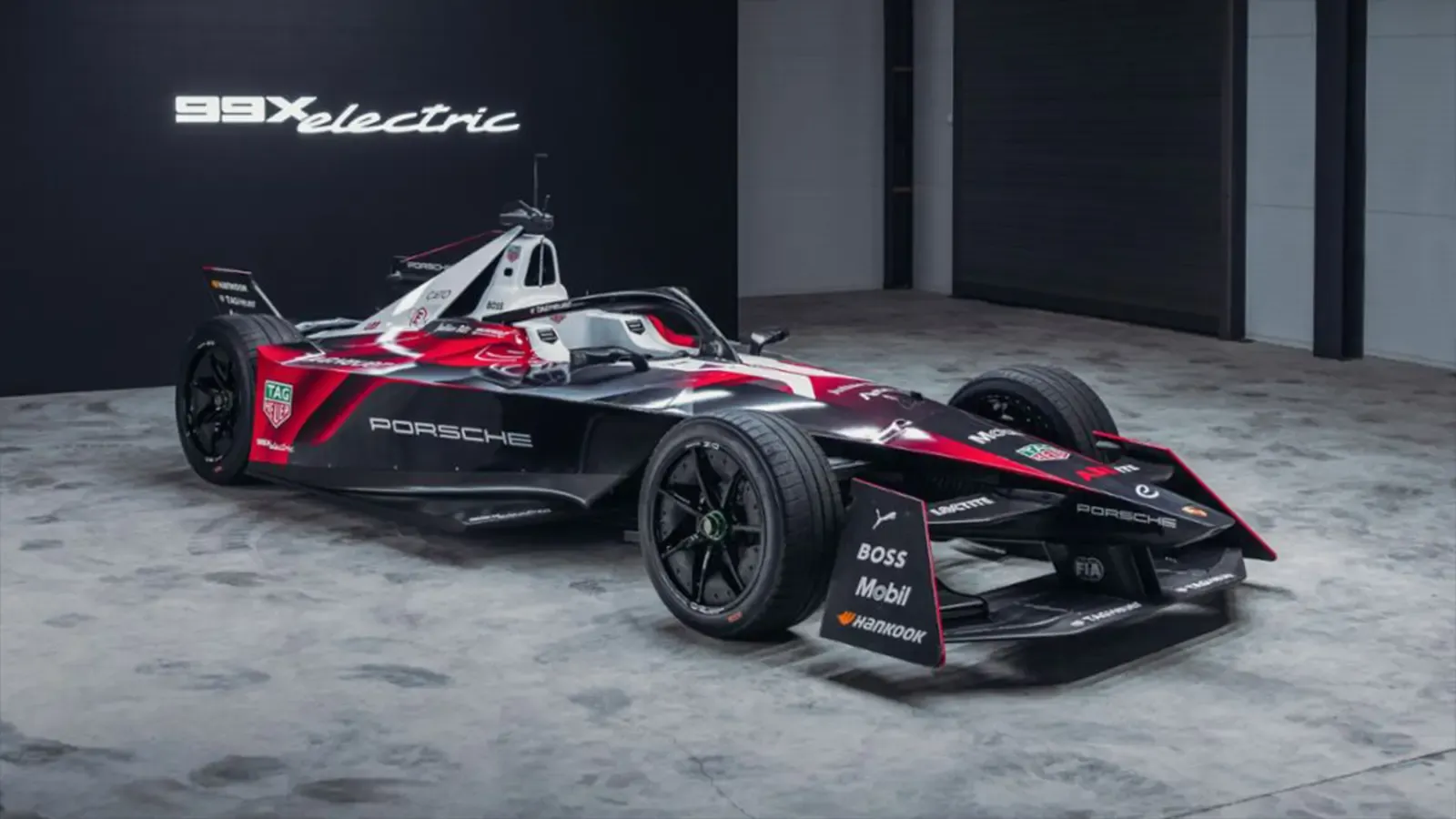 Porsche Formula E EV Racecar indoors.