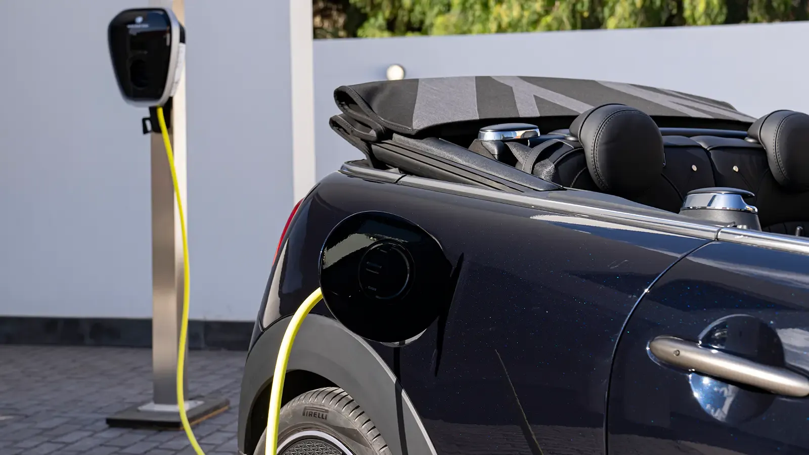 Mini Convertible charging at station
