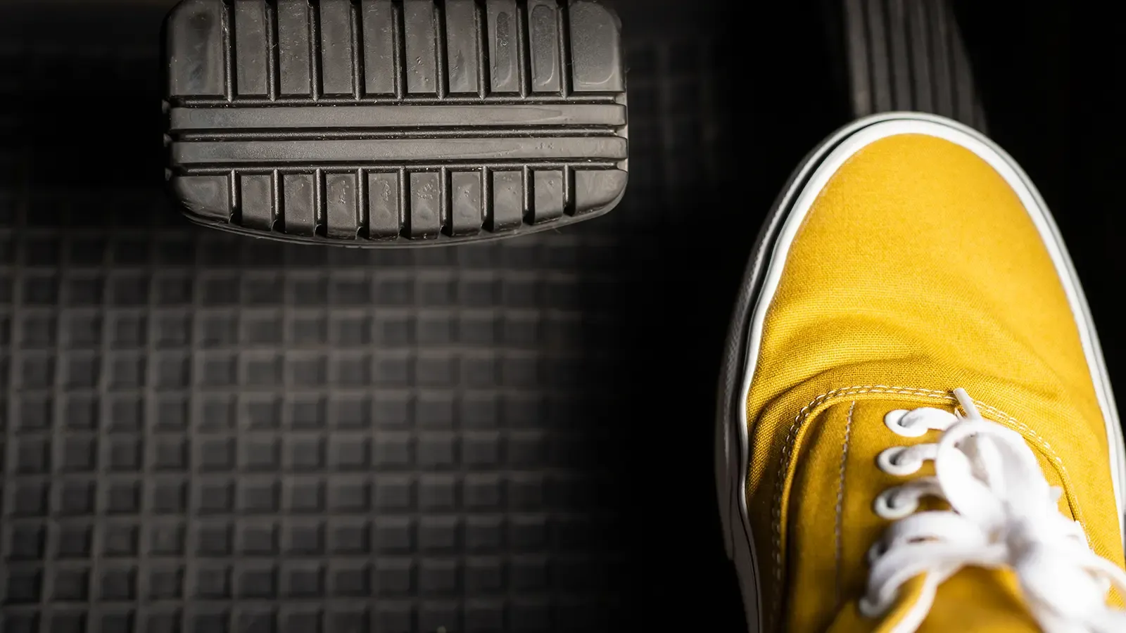 Person pressing pedals. 