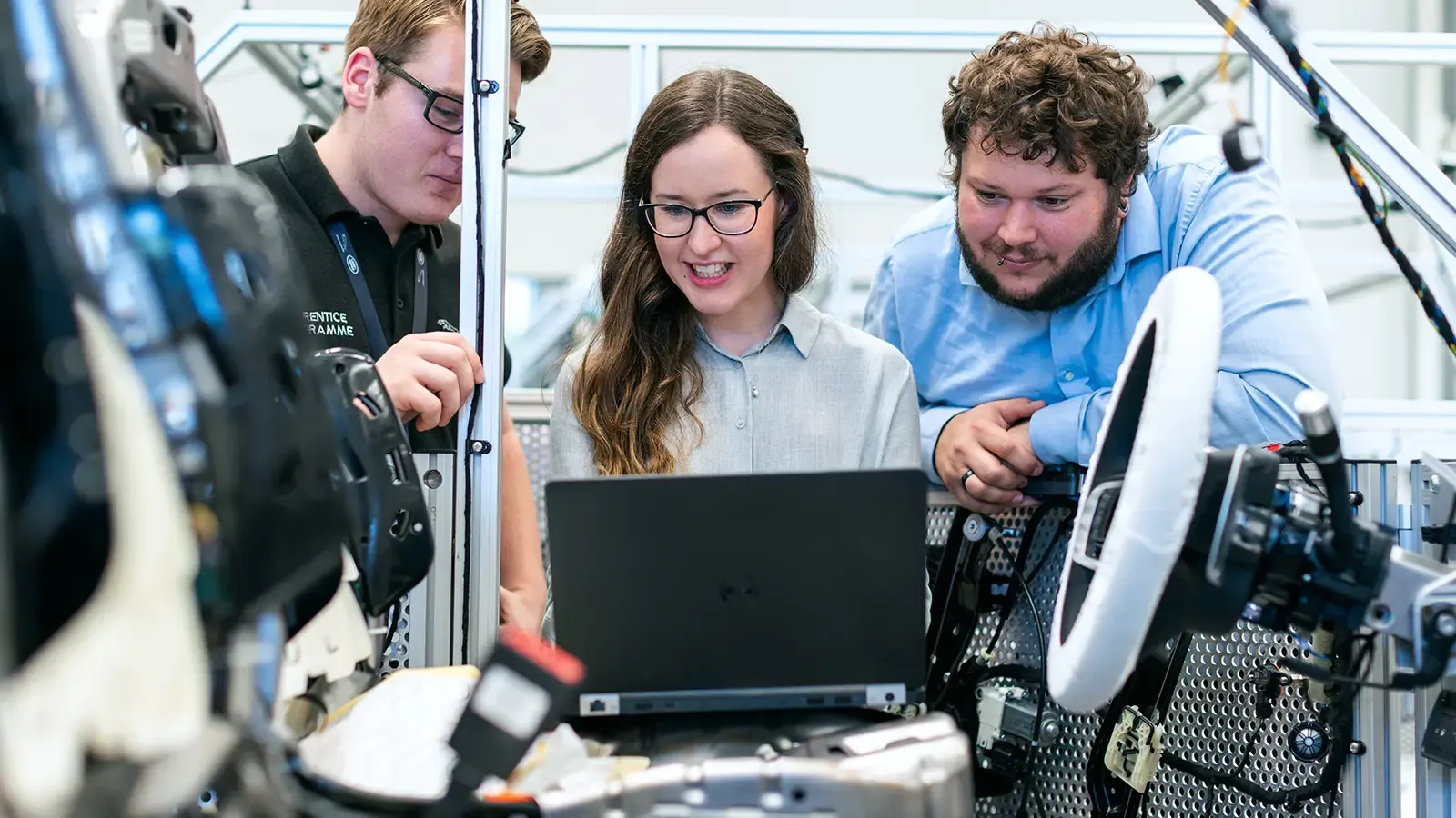 Engineers working at a computer 