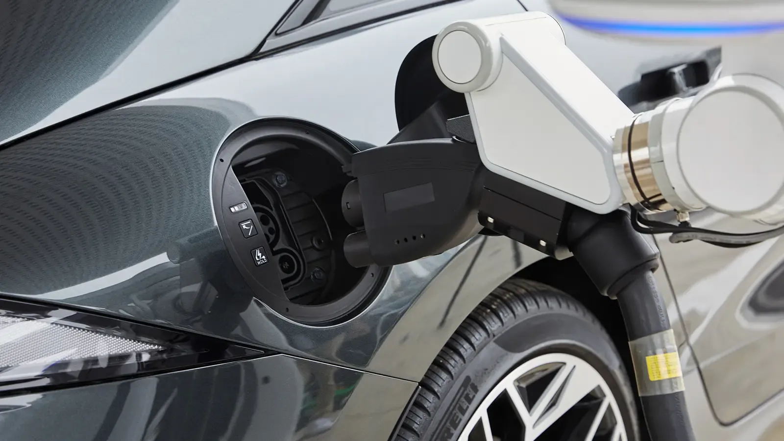 EV Charging Robot Charging an Electric Car