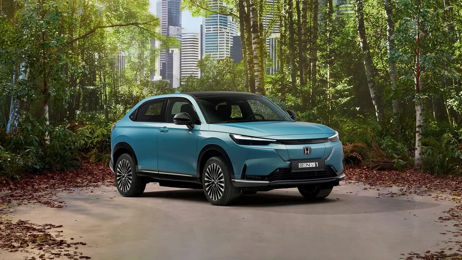 Honda e:Ny1 blue exterior in a forest 