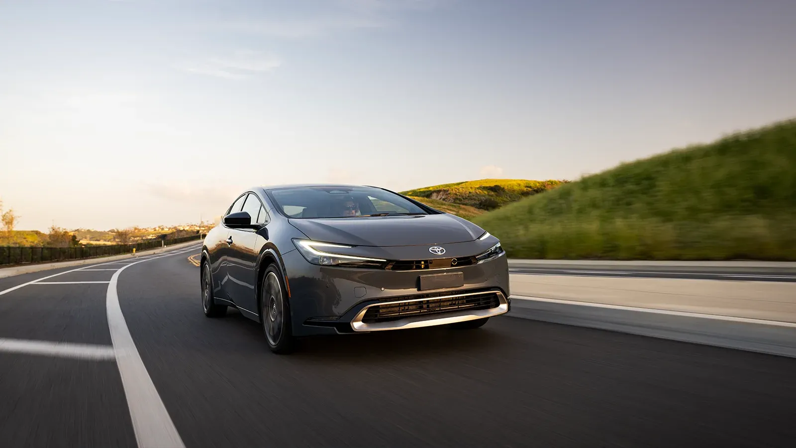 Toyota Prius driving along the coast