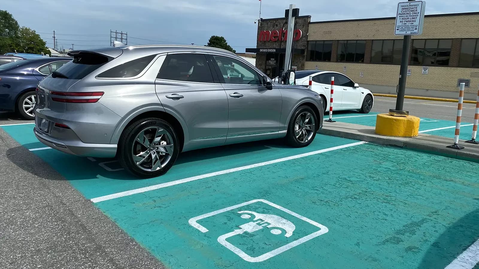Genesis E-GV70 in a charging station 