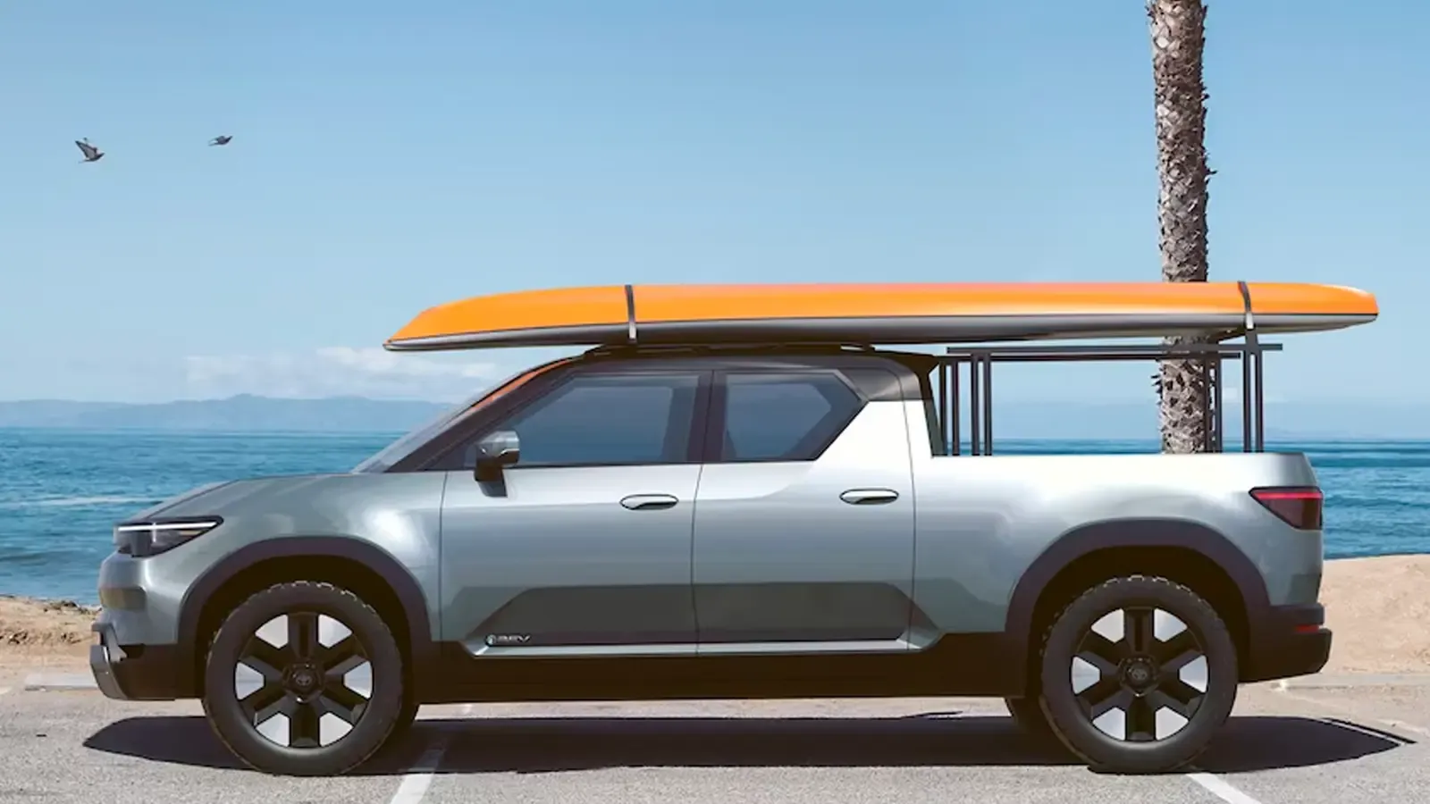 Toyota EPU Concept EV pickup with a surfboard on the hood