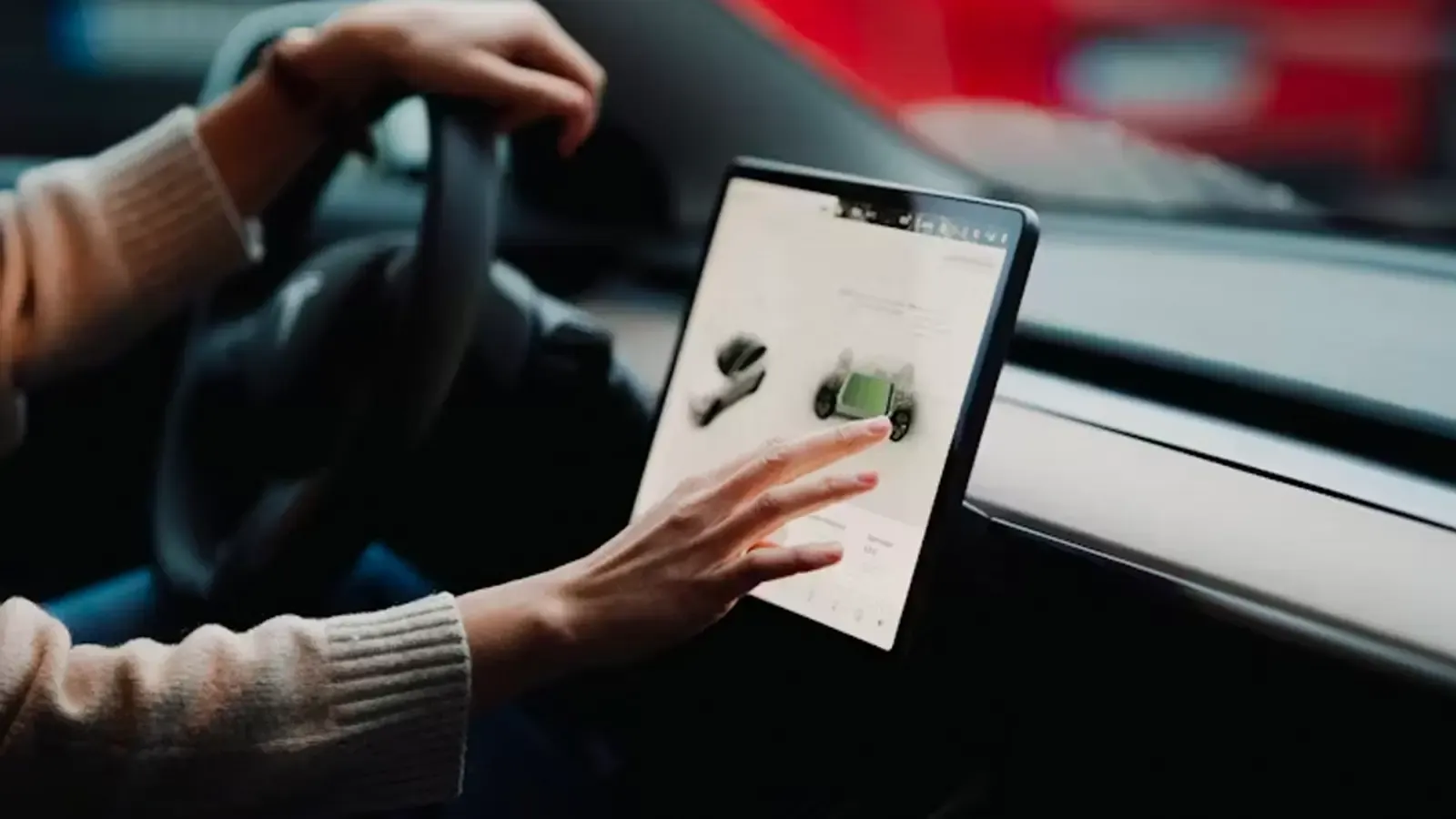Person checking on their ev battery on their navigation screen