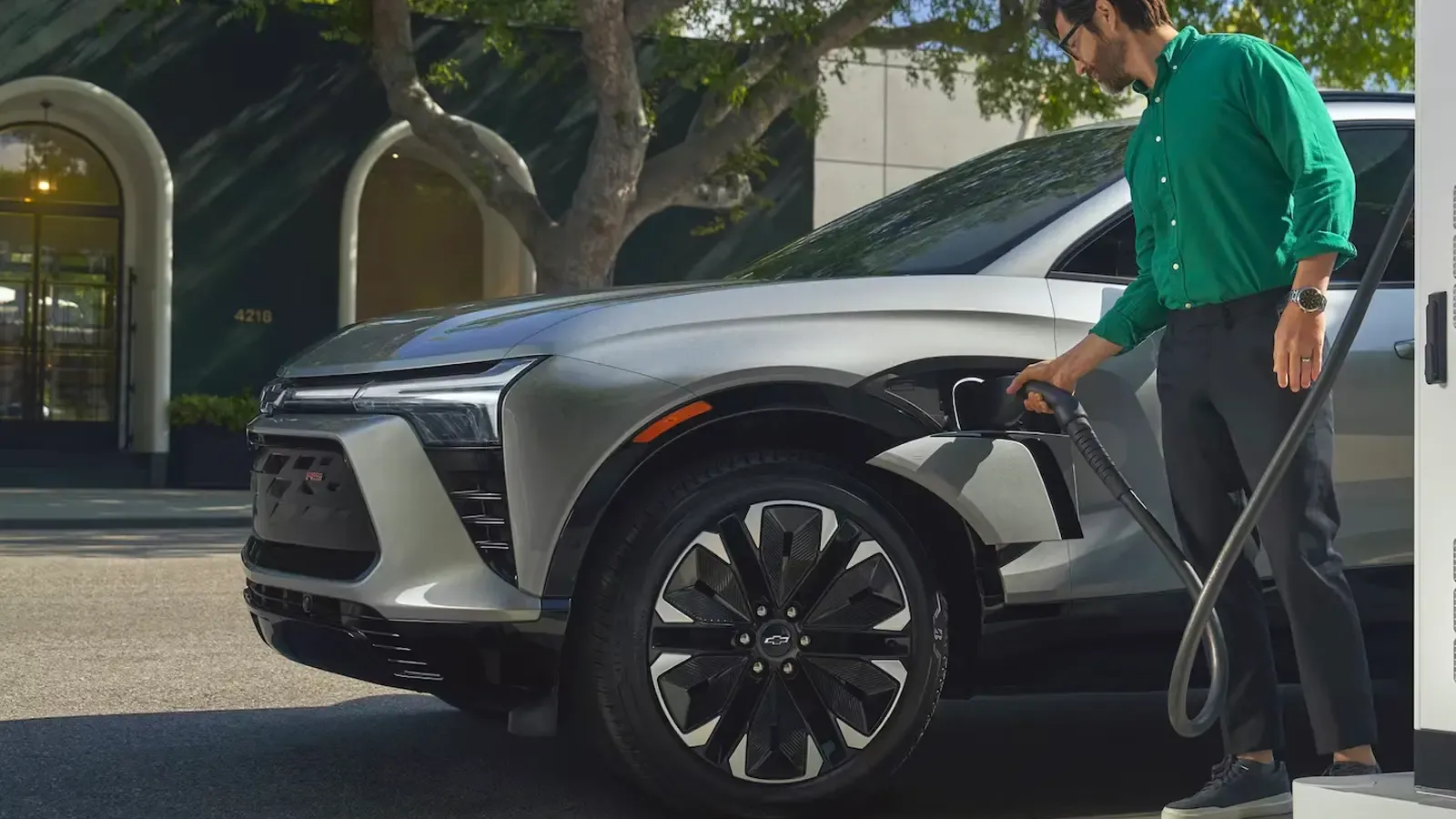 Chevrolet Blazer EV being charged at a station