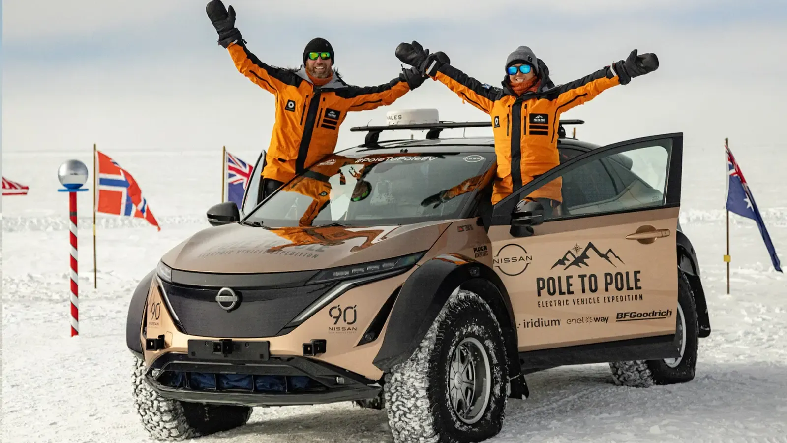 Chris and Julie Ramsey, husband and wife adventurers and their Nissan Ariya they used on their pole to pole expedition 