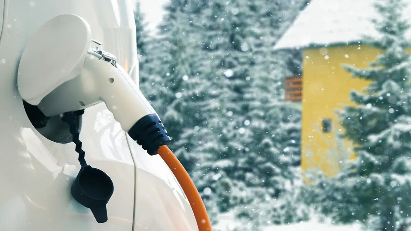 Close up of a car charger being used in snowy conditions 