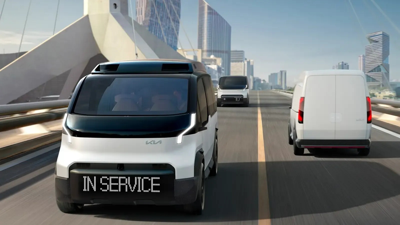 Kia PV5 Van driving on a bridge