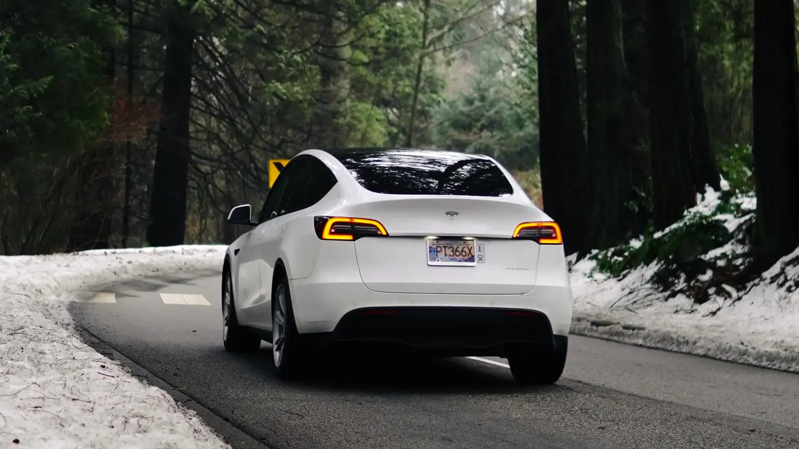 Tesla Model X driving on a wintery road