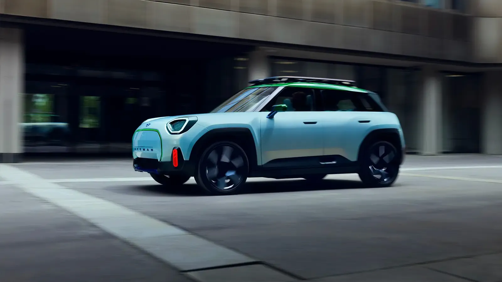 Mini Aceman EV driving on a road 