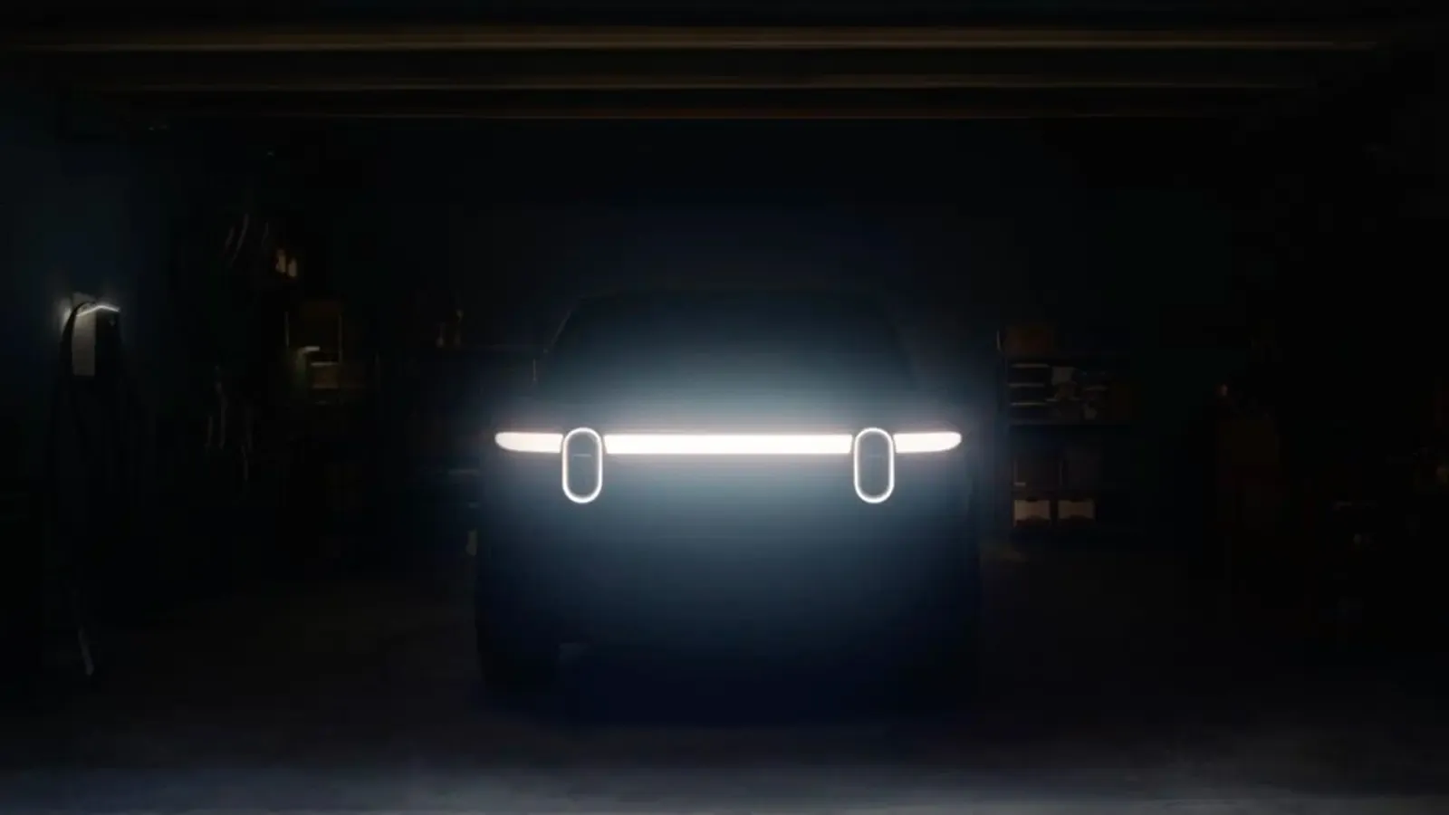 Rivian R2 preview in a garage