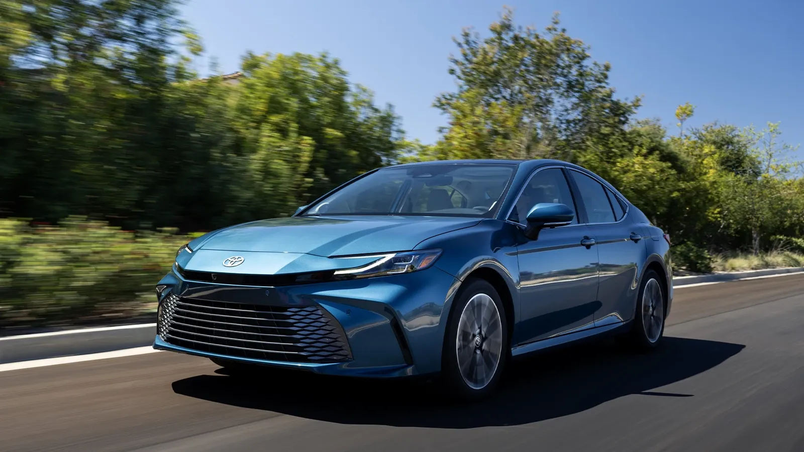 Blue 2025 Toyota Camry Hybrid 