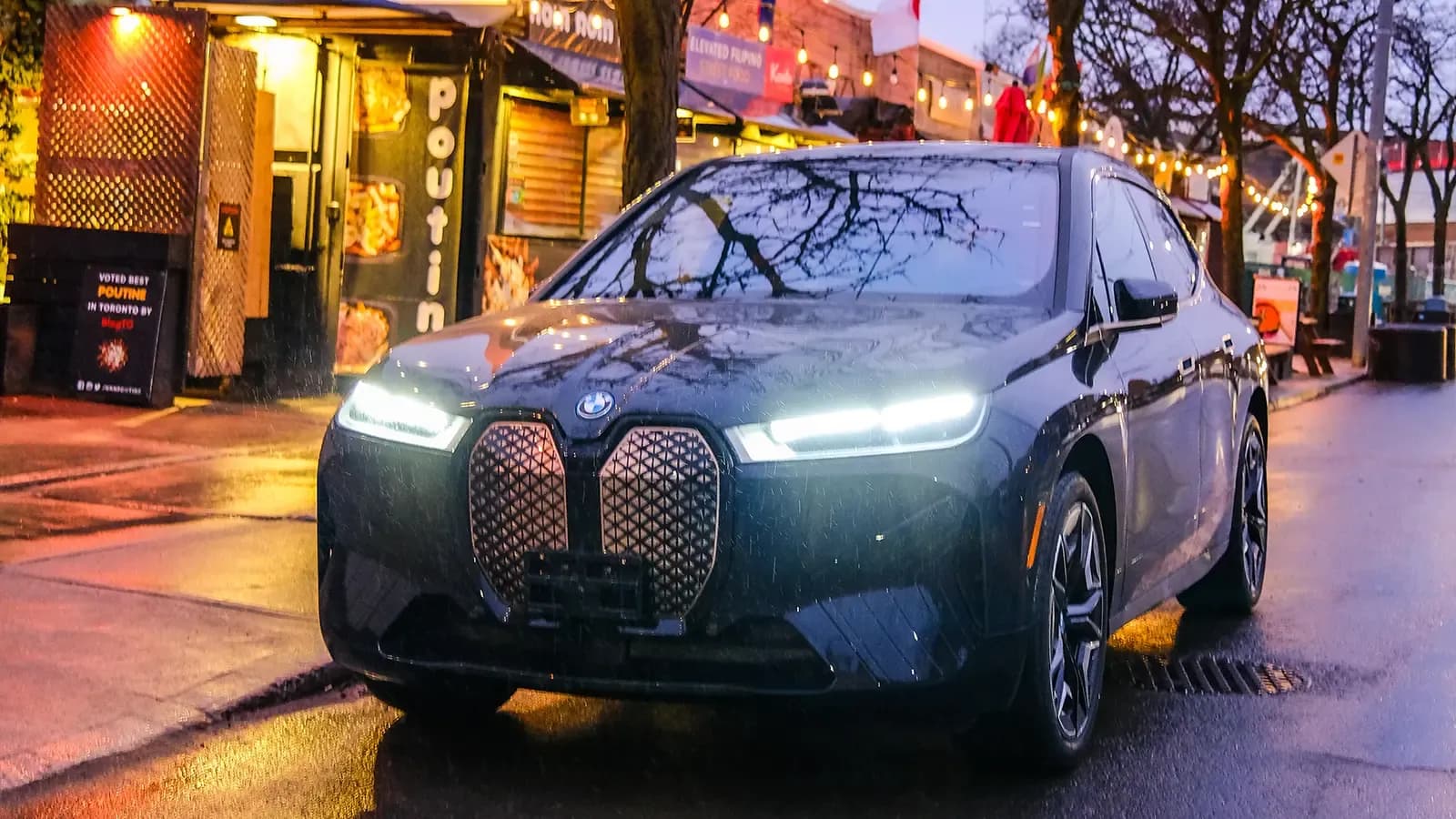 2025 BMW iX parked on the side of road 