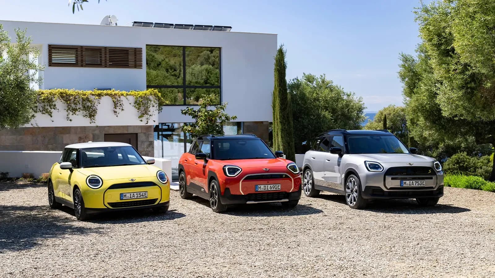 three Mini Acemans parked 