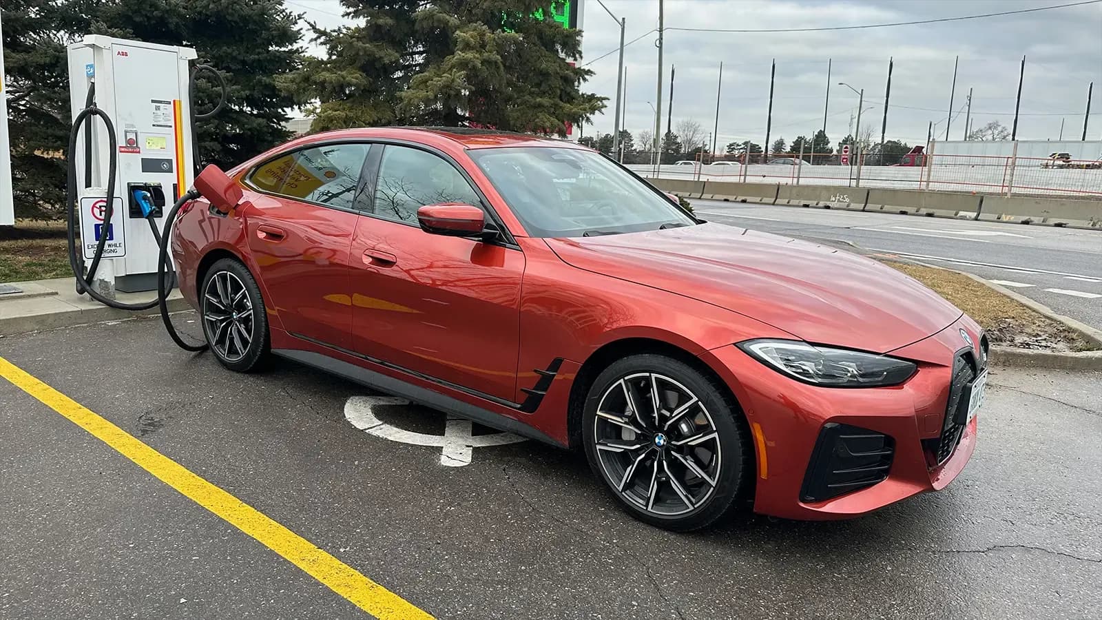 red BMW i4 xDrive40 parked 