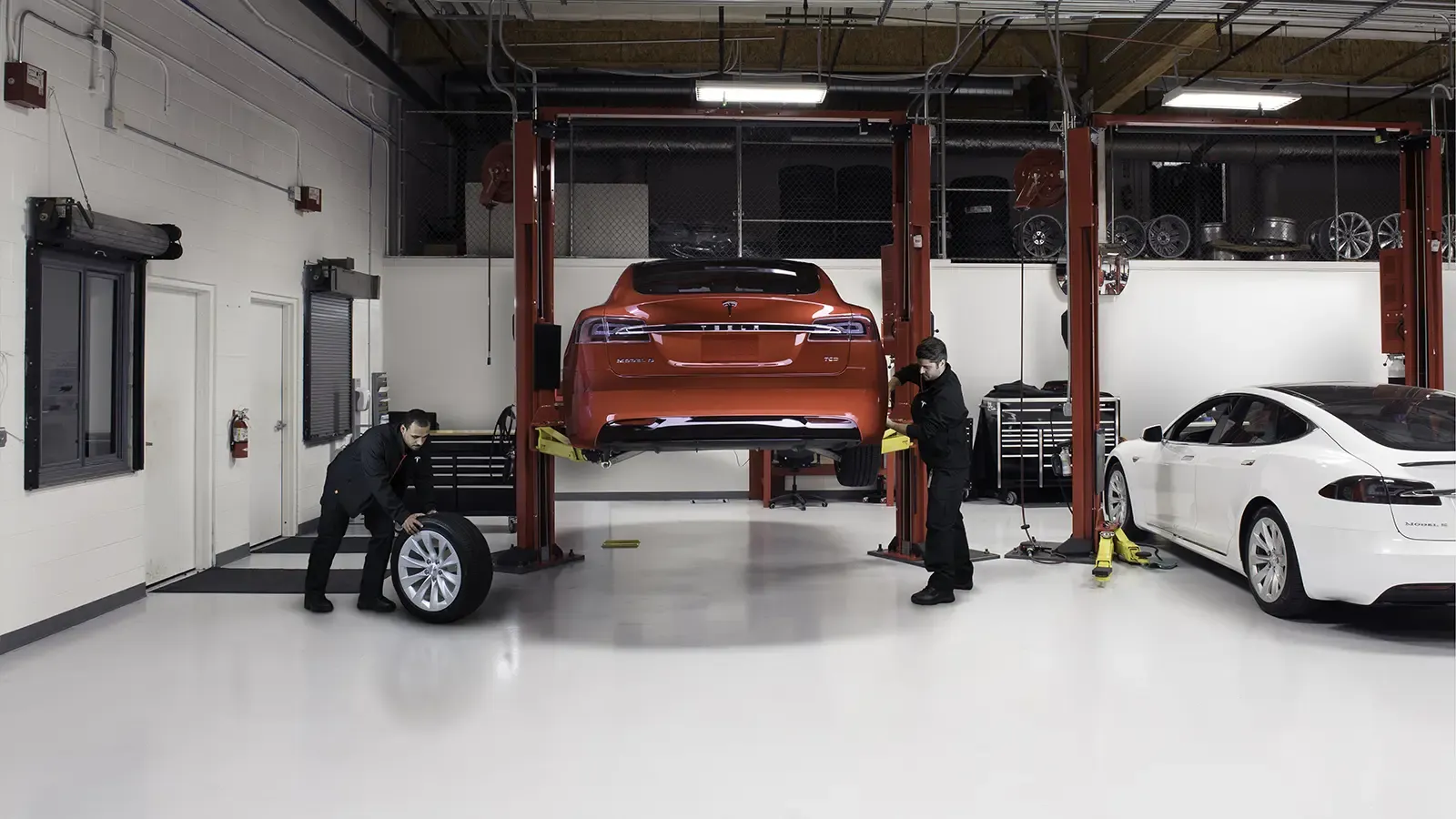 Tesla EV's at a repair shop