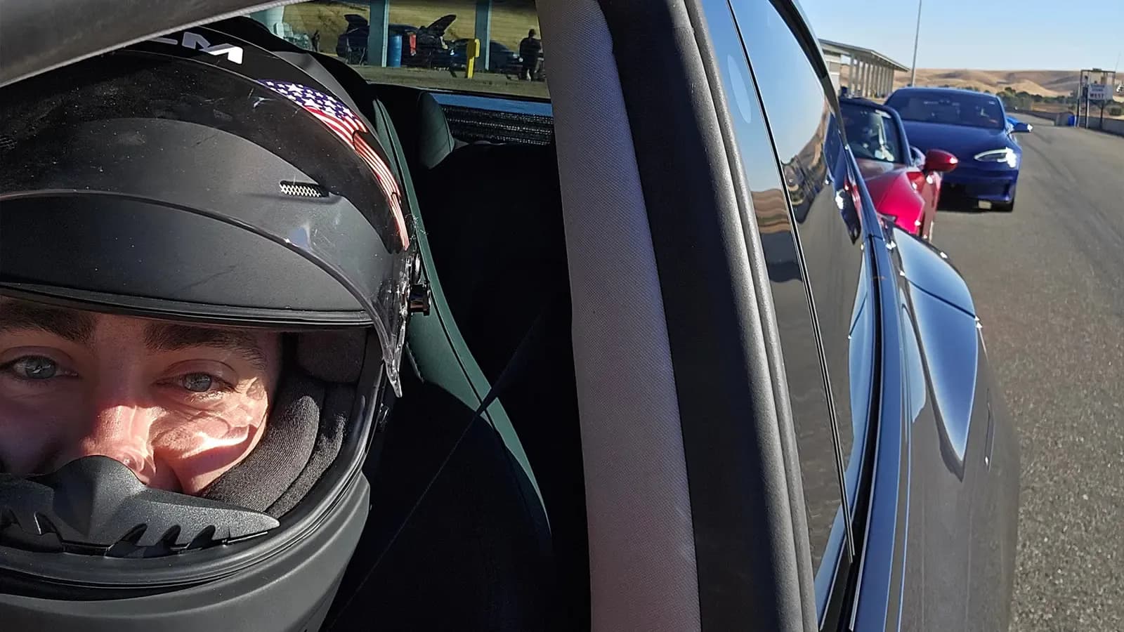 driver in Tesla Model 3 