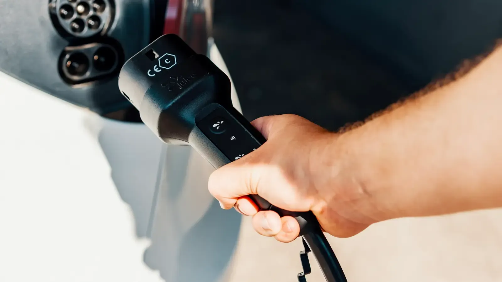 Person using car charger 