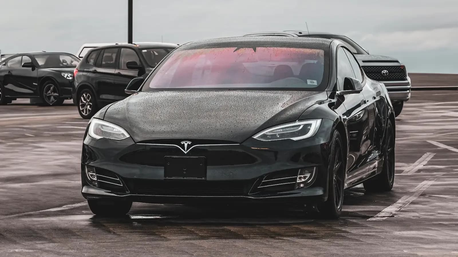 Tesla Model S exterior front view in a parking lot 