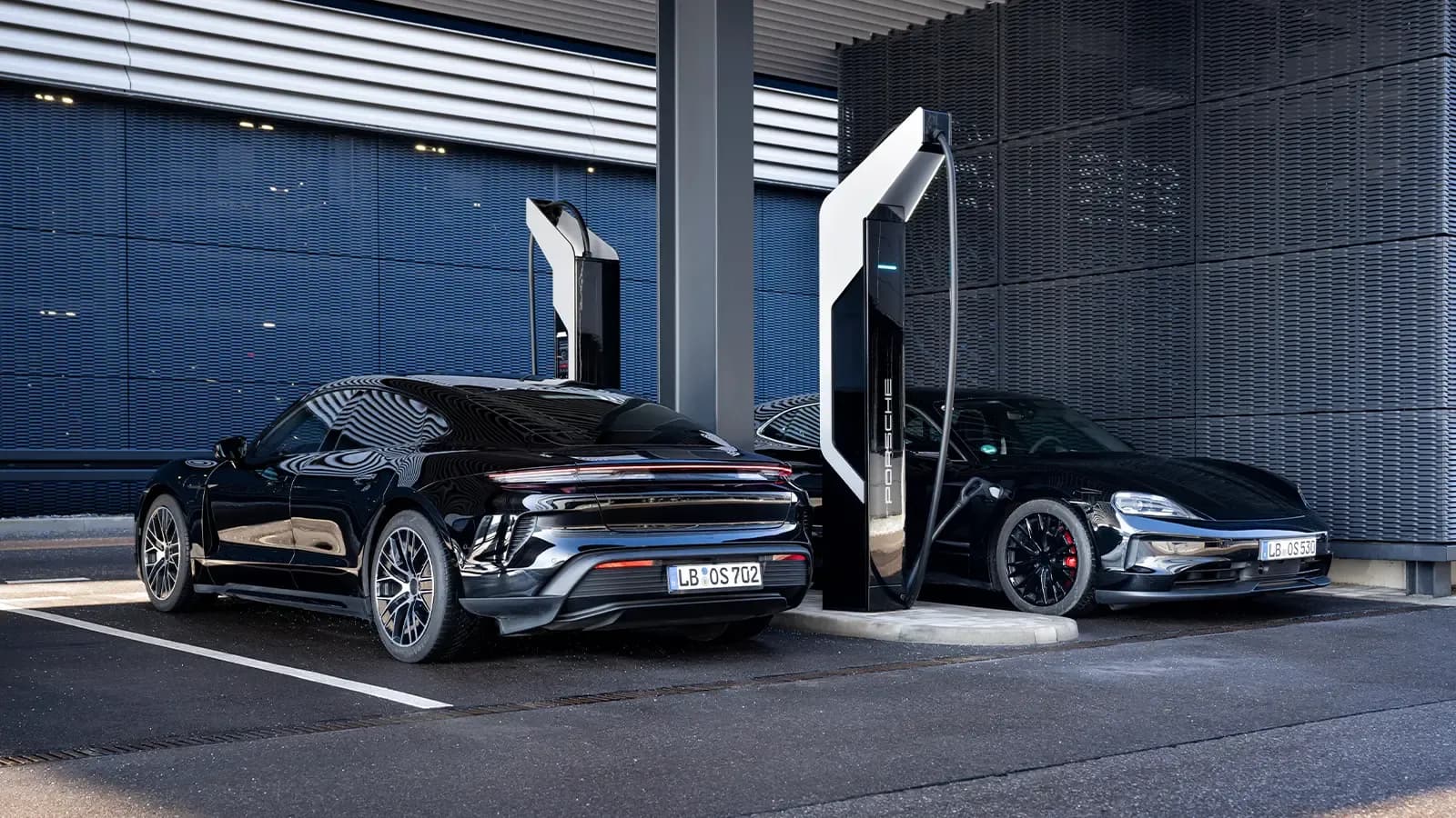 Two electric Porches using public EV fast charger