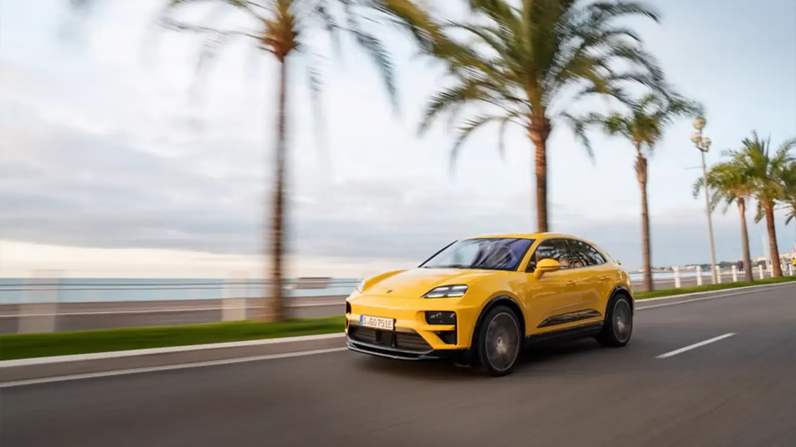 yellow Porsche Macan EV