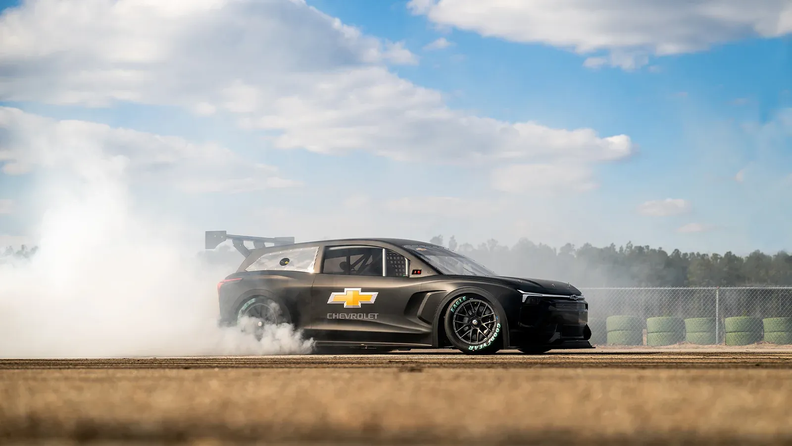 The Chevrolet Blazer EV.R NASCAR Prototype does a smoky burnout