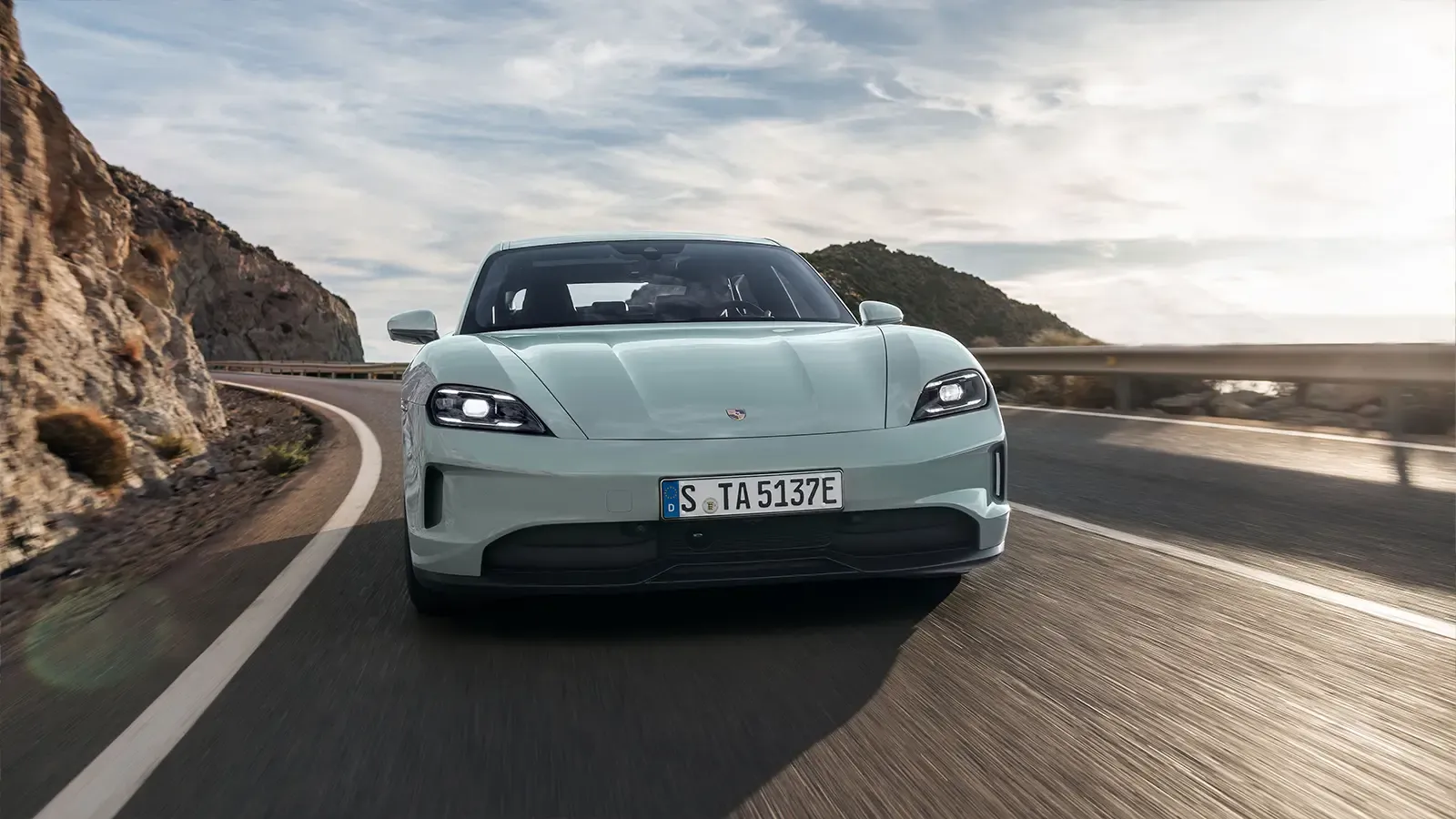 A Porsche Tycan Driving