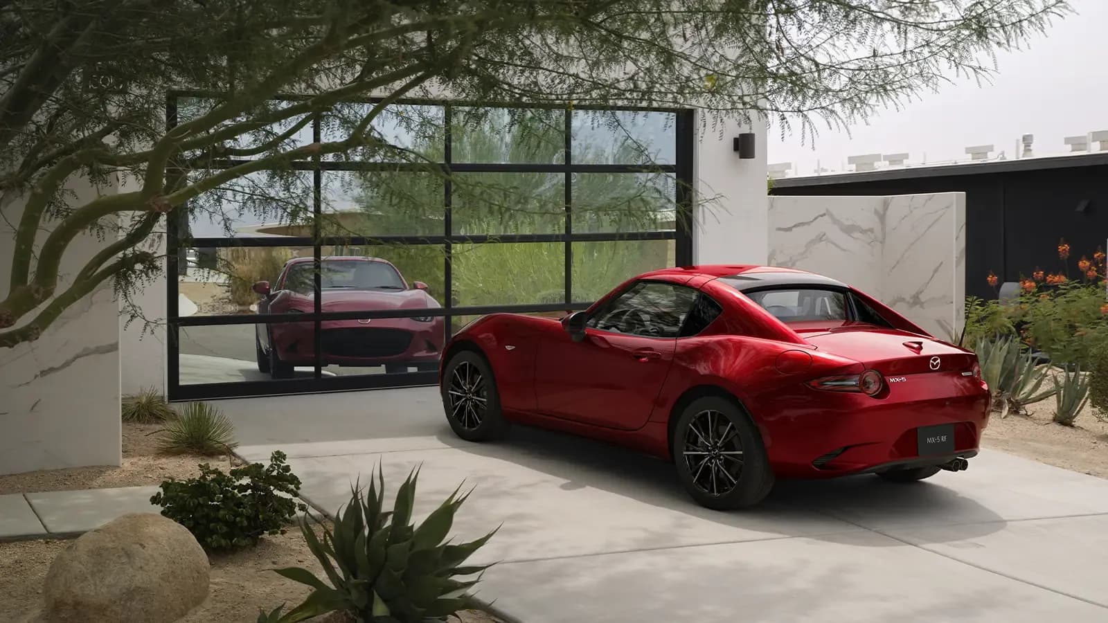 A red 2025 Mazda MX-5 Miata