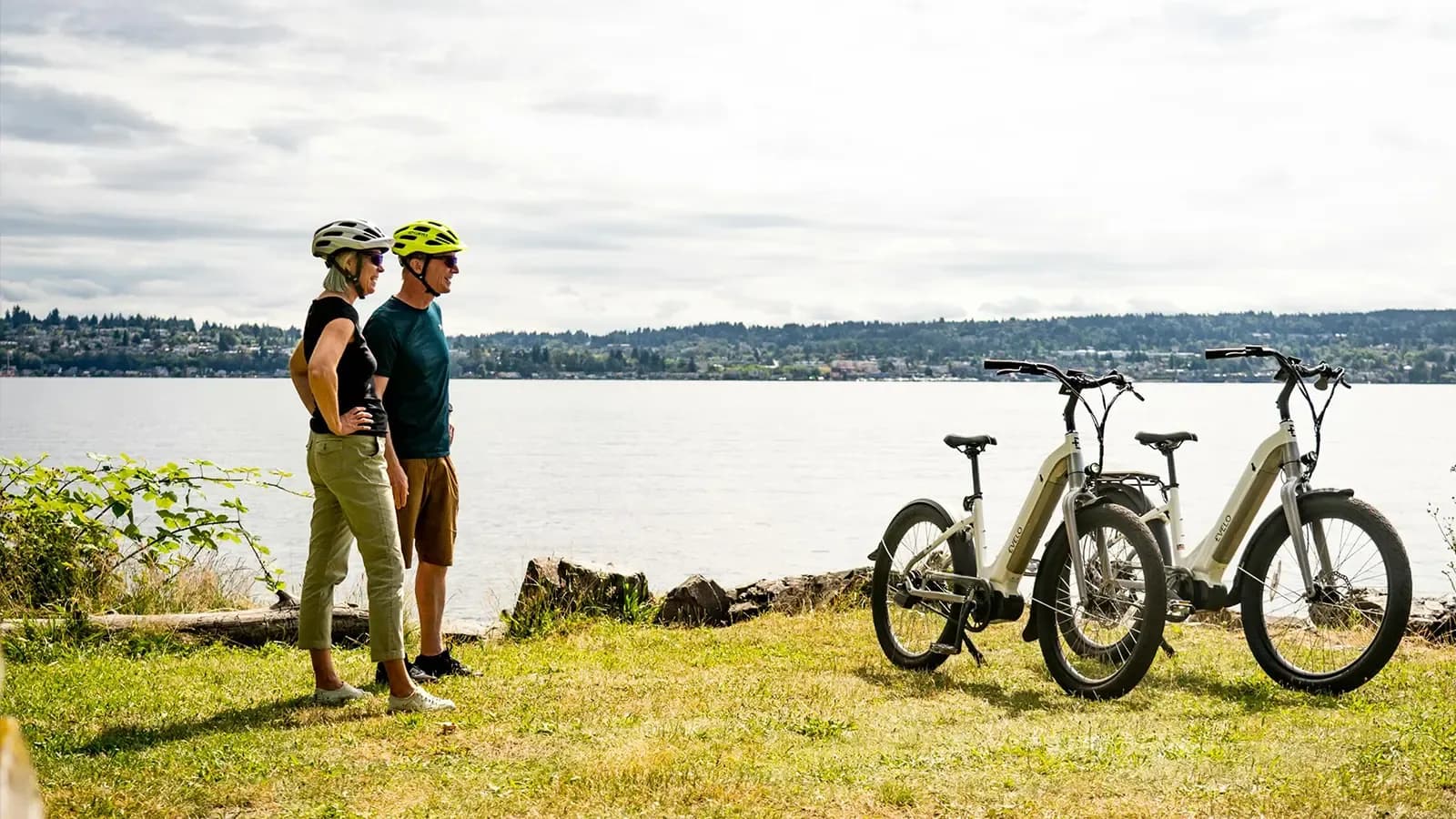 A couple looking at the view with two e-bikes
