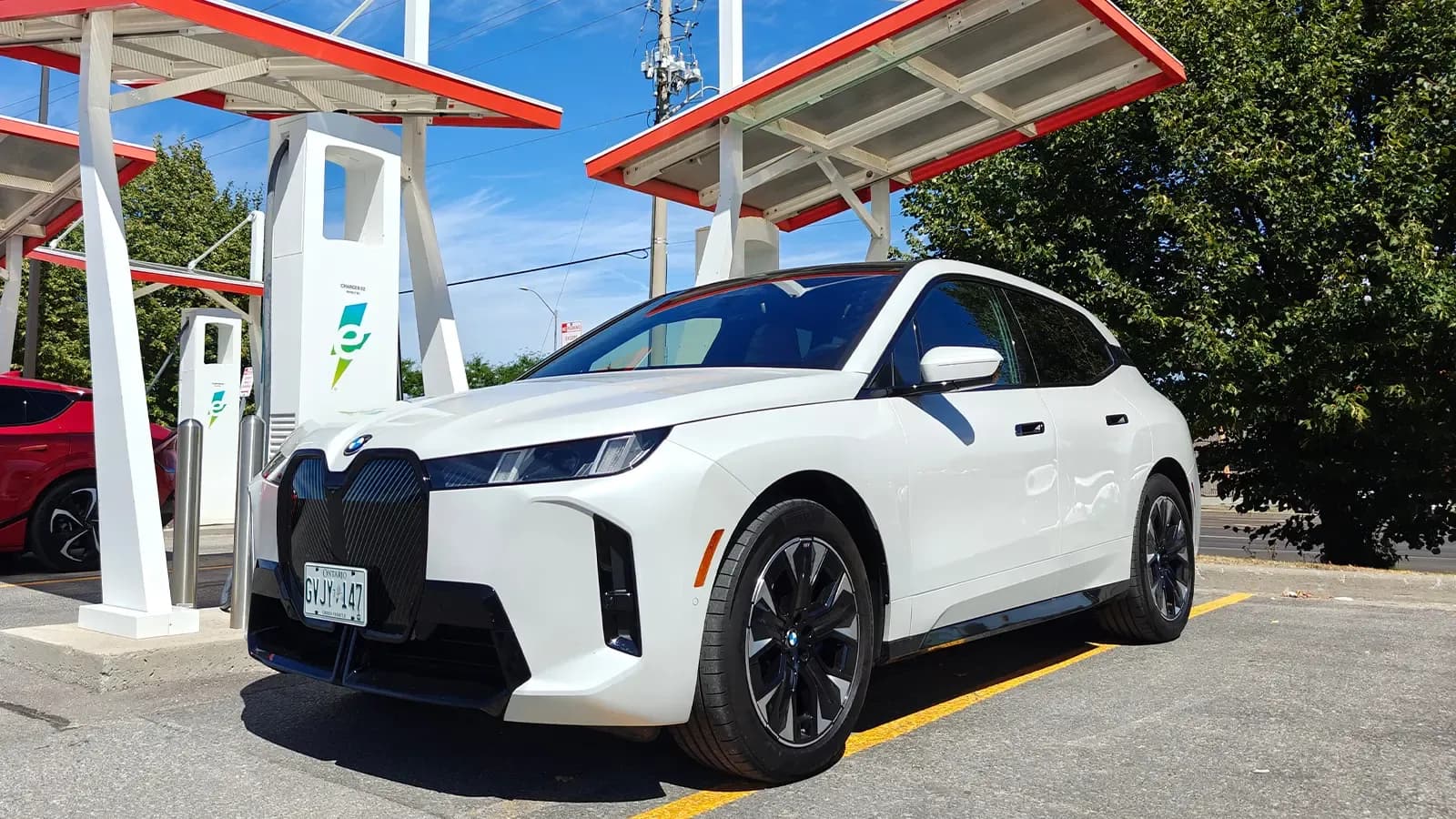 A white 2026 BMW iX xDrive60