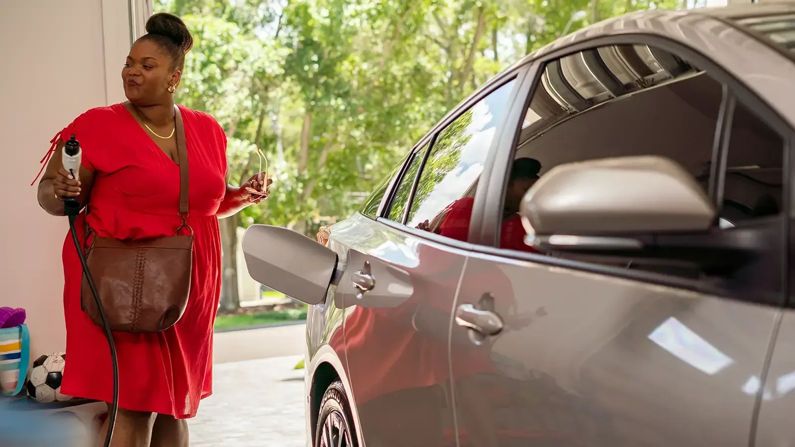 Woman charging car