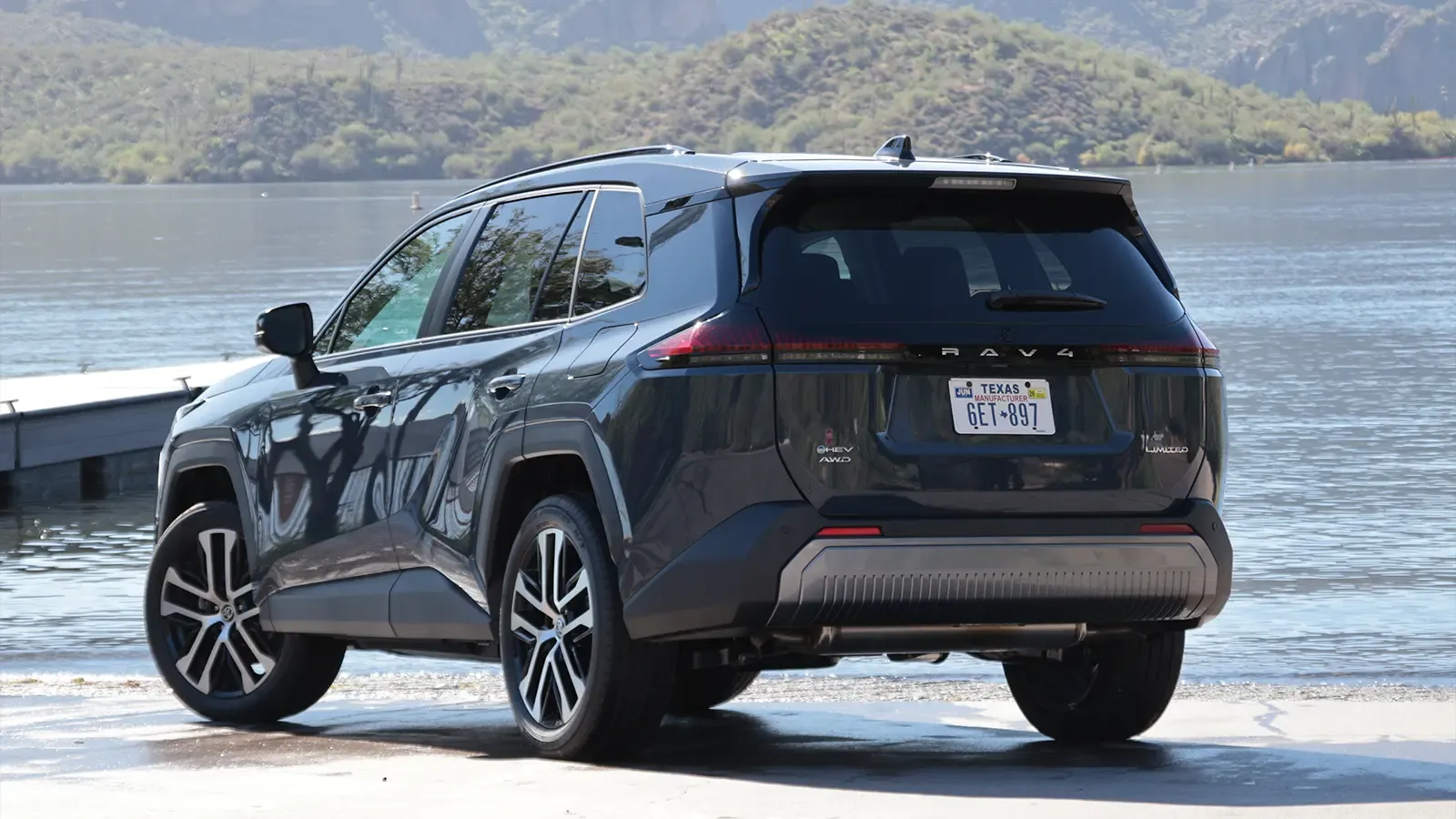 A blue 2026 Toyota Rav4 hybrid rear view
