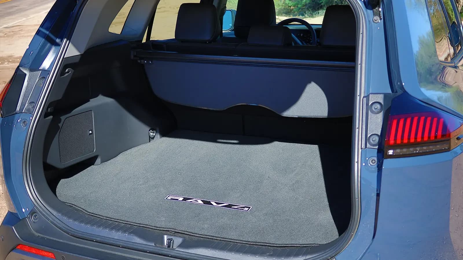 A gray 2026 Toyota Rav4 hybrid cargo bay