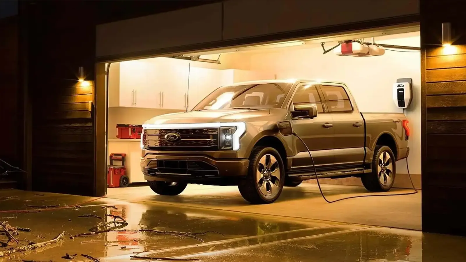 A Ford F-150 Lighting parked in a garage
