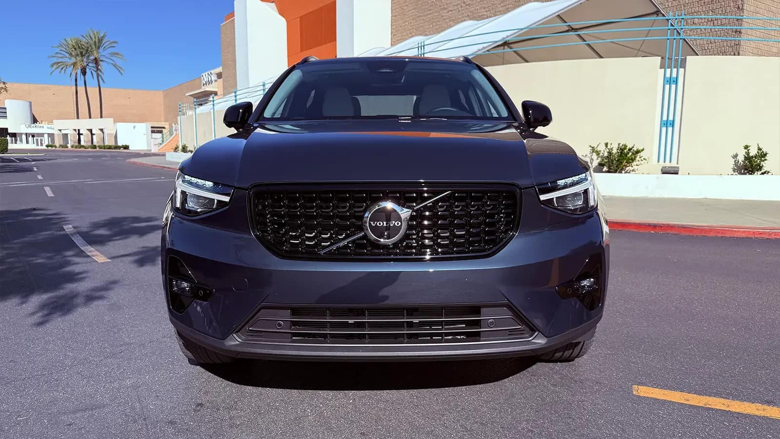 A 2026 dark blue Volvo XC40 front view