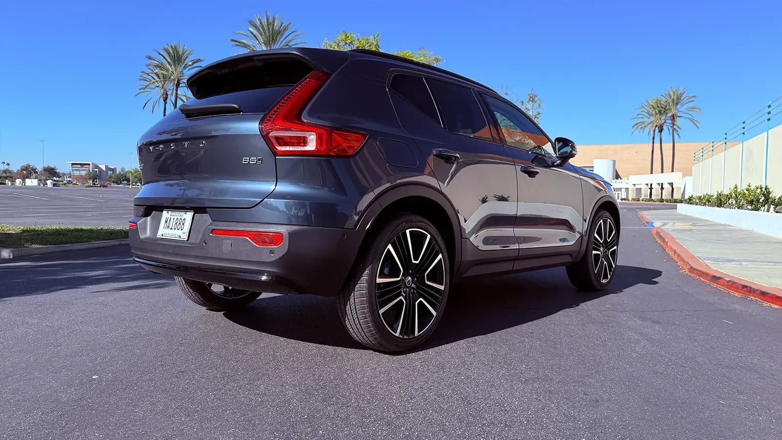A 2026 dark blue Volvo XC40 side 3 quarter view