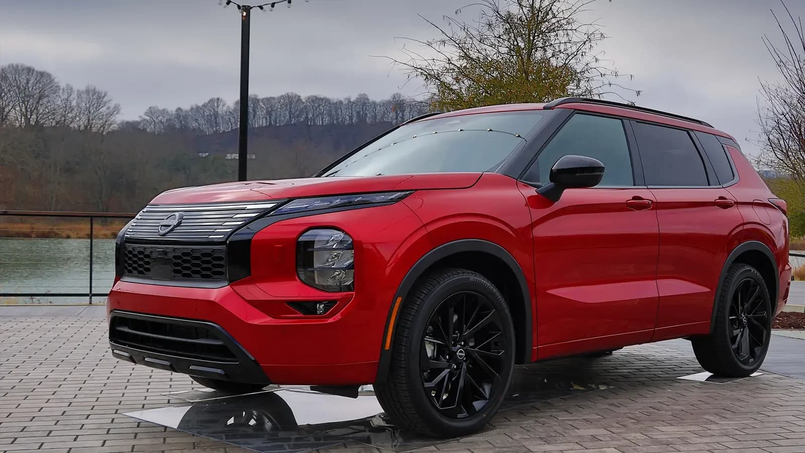 A red 2026 Nissan Rogue Plug-In Hybrid