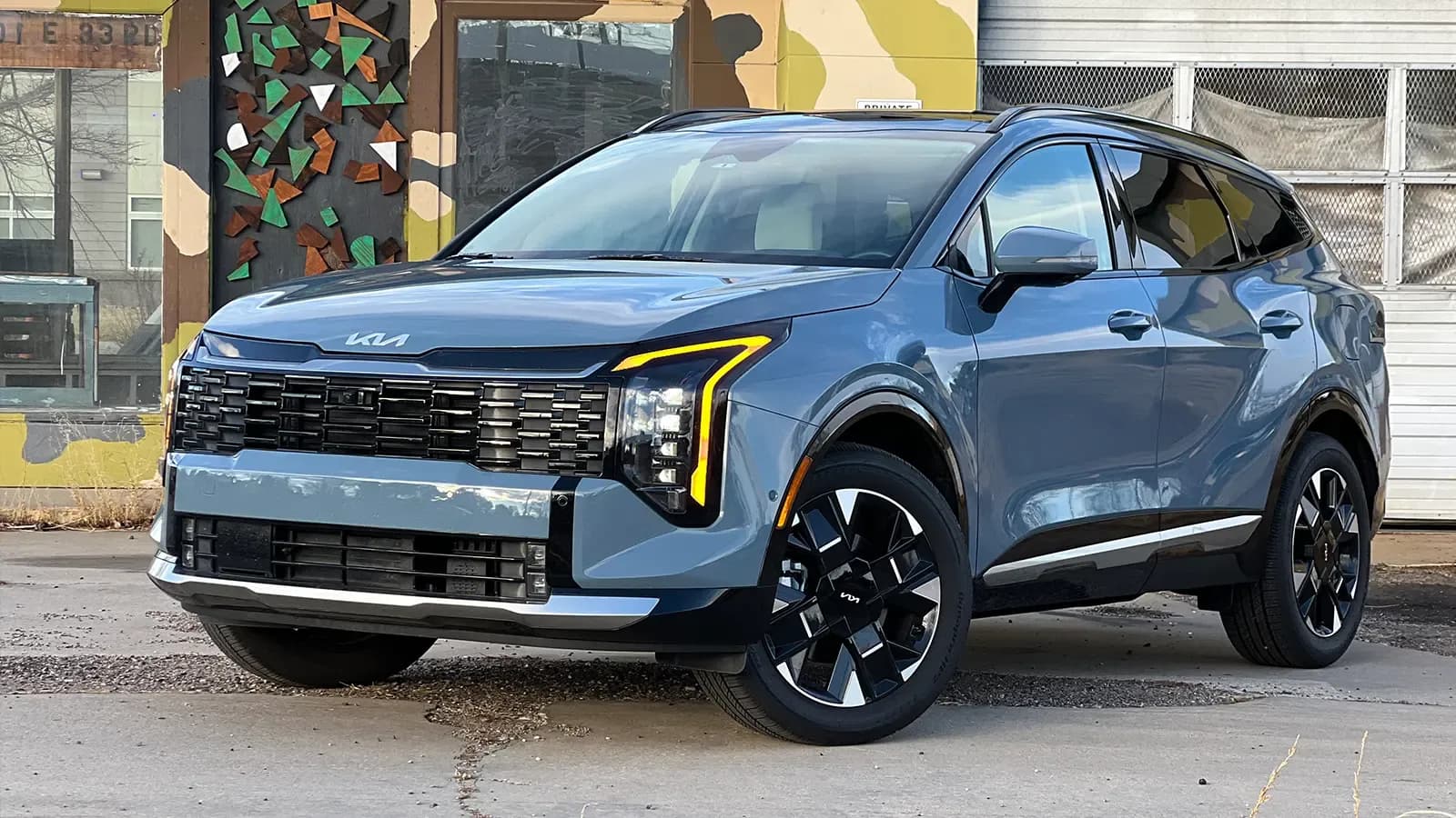 A dark blue 2026 Kia Sportage Hybrid SX Prestige 