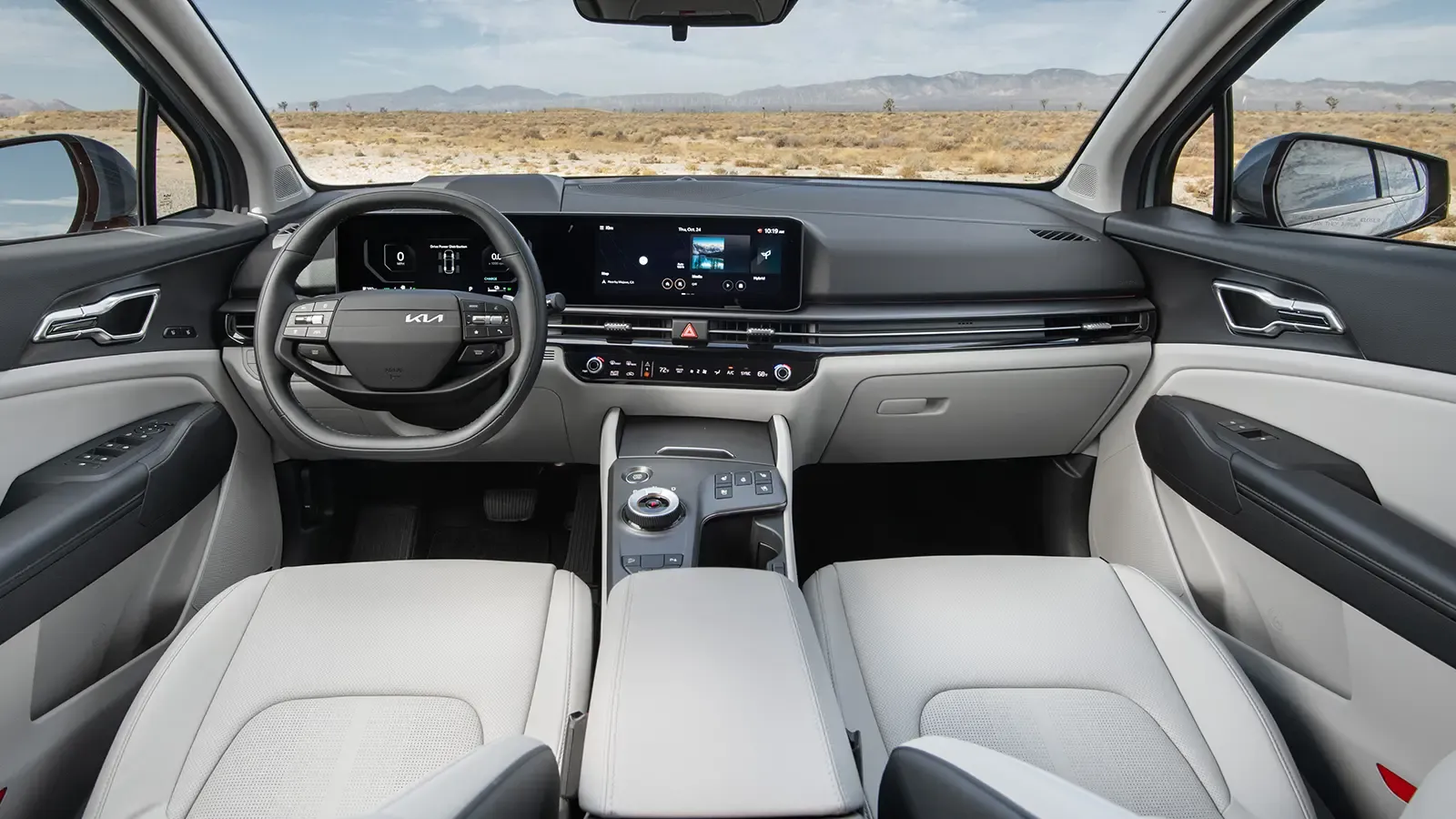 A gray 2026 Kia Sportage interior driver front view