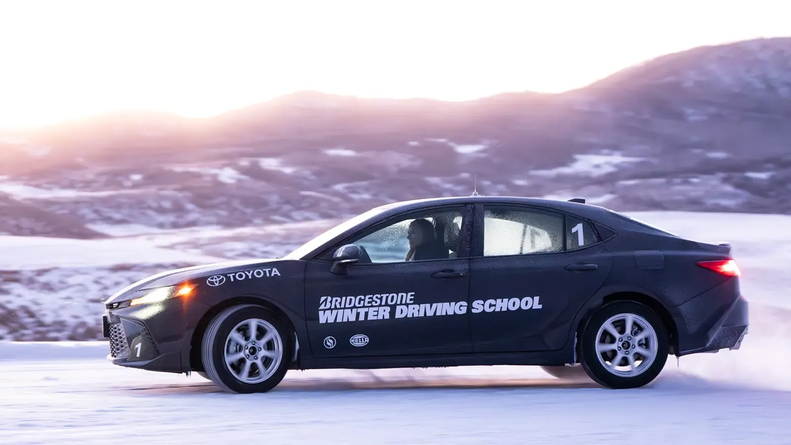 A 2026 Toyota Camry All-Wheel Drive side view