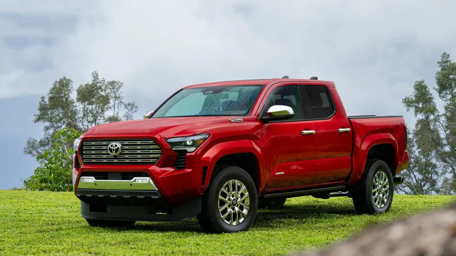 A red  Toyota Tacoma Limited